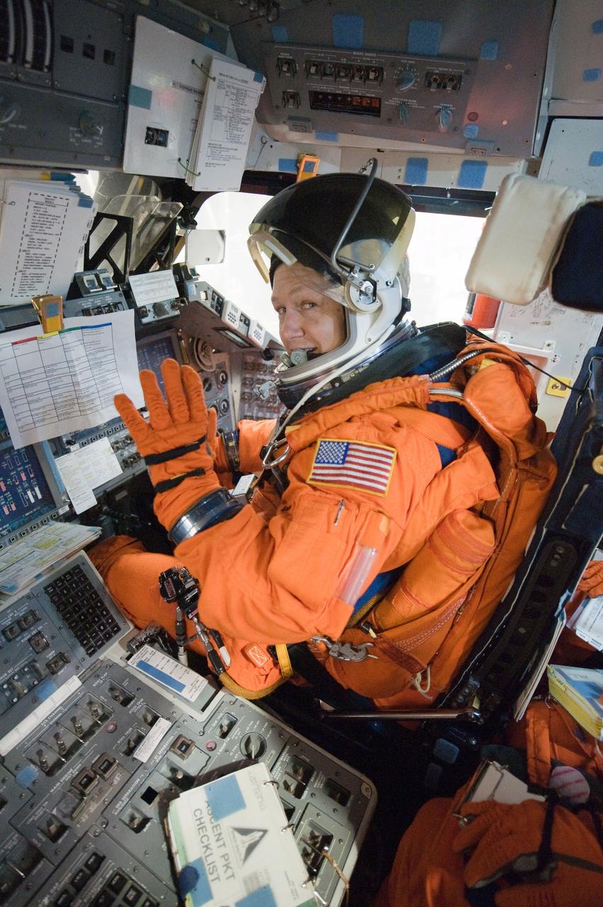 JSC2010-E-196892 (20 Dec. 2010) --- While seated at the pilot?s station, NASA astronaut Doug Hurley, STS-135 pilot, participates in a post insertion/de-orbit training session on the flight deck of the crew compartment trainer (CCT-2) in the Space Vehicle Mockup Facility at NASA's Johnson Space Center. Hurley is wearing a training version of his shuttle launch and entry suit. STS-135 is planned to be the final mission of the space shuttle program. Photo credit: NASA or National Aeronautics and Space Administration
