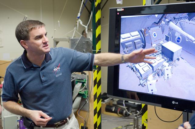 NASA image: EVA training for Exp. 27 crew member Ron Garan, Exp. 28 Mike Fossum and STS-135 Doug Hurley, Rex Walheim and Sandra Magnus   