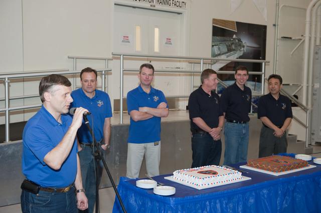 NASA image: Expedition 27/28 Cake Cutting Ceremony in building 5 high bay