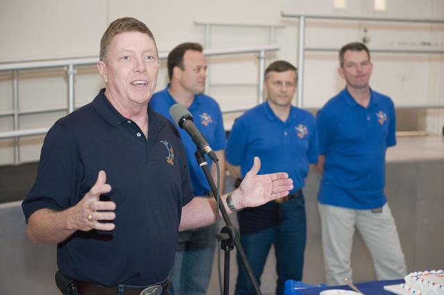 NASA image: Expedition 27/28 Cake Cutting Ceremony in building 5 high bay
