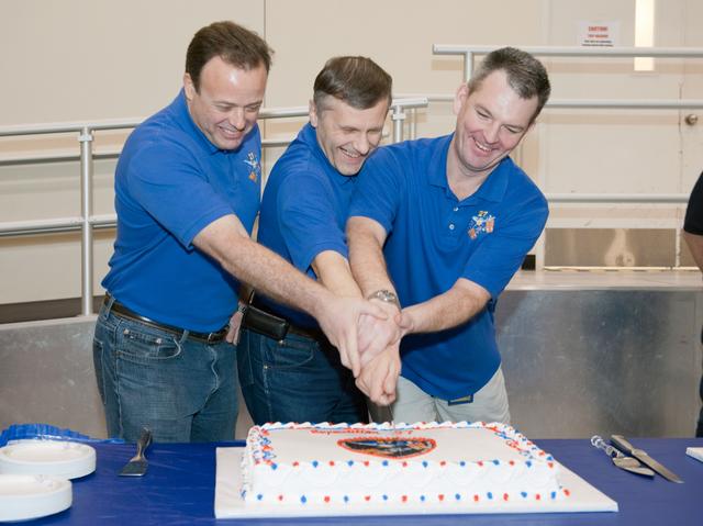 NASA image: Expedition 27/28 Cake Cutting Ceremony in building 5 high bay