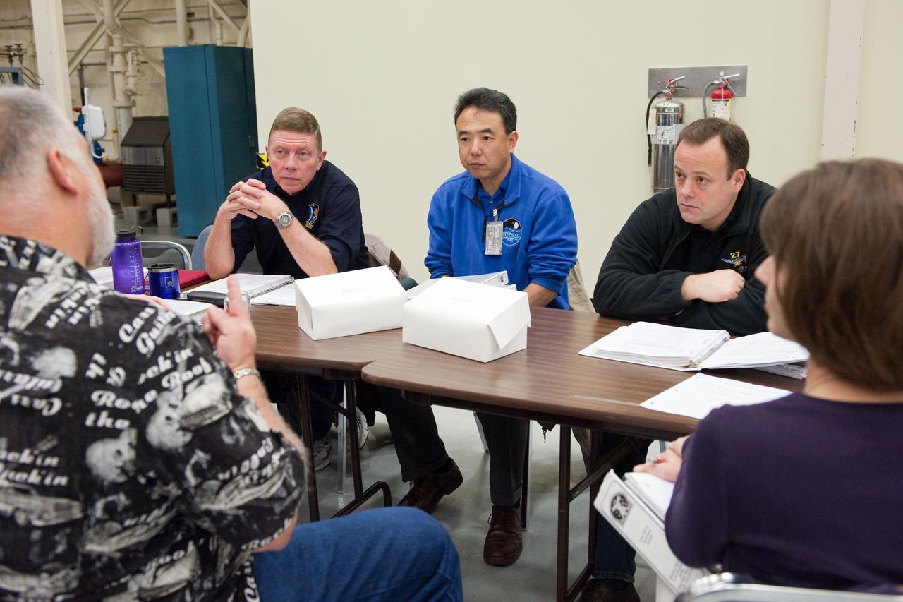 PHOTO DATE:  01-25-11 LOCATION: Bldg 9NW,  ISS Mockups SUBJECT:  Expedition 28 crew member and JAXA astronaut Satoshi Furukawa during ISS EVA P/P 33105 training with STS-135 crew members PHOTOGRAPHER:  James Blair 
