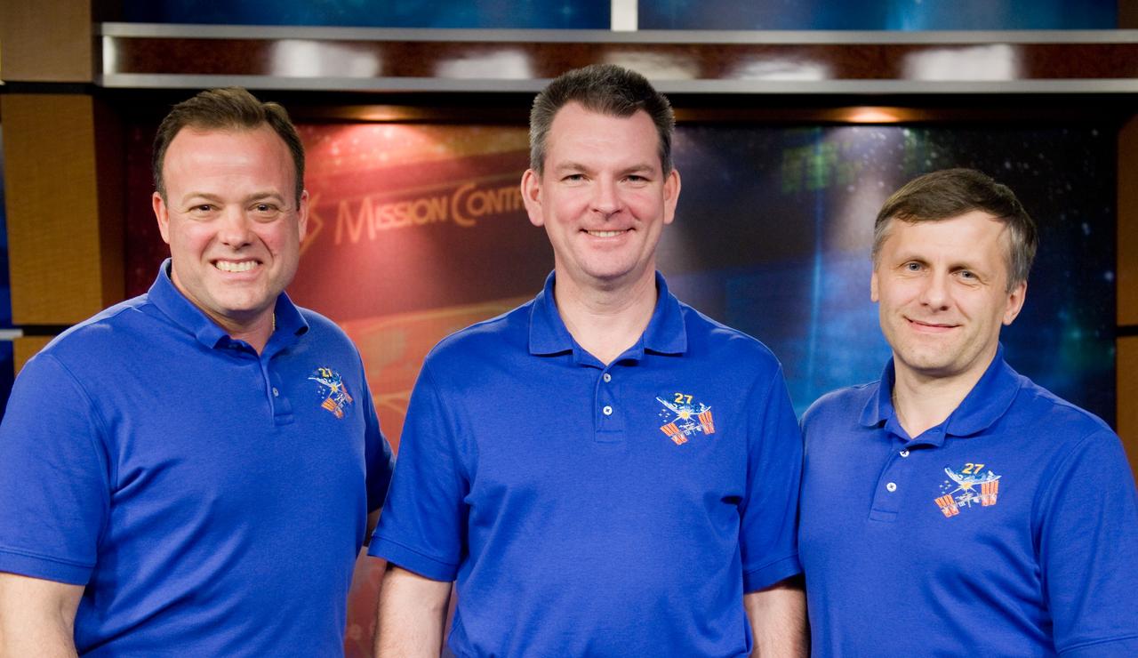 PHOTO DATE:  01-26-11 LOCATION:  Bldg 2 SUBJECT:  Expedition 27 press conference with NASA astronaut Ron Garan and his crewmates, Russian cosmonauts Aleksandr Samokutyayev and Andrei Borisenko PHOTOGRAPHER: James Blair