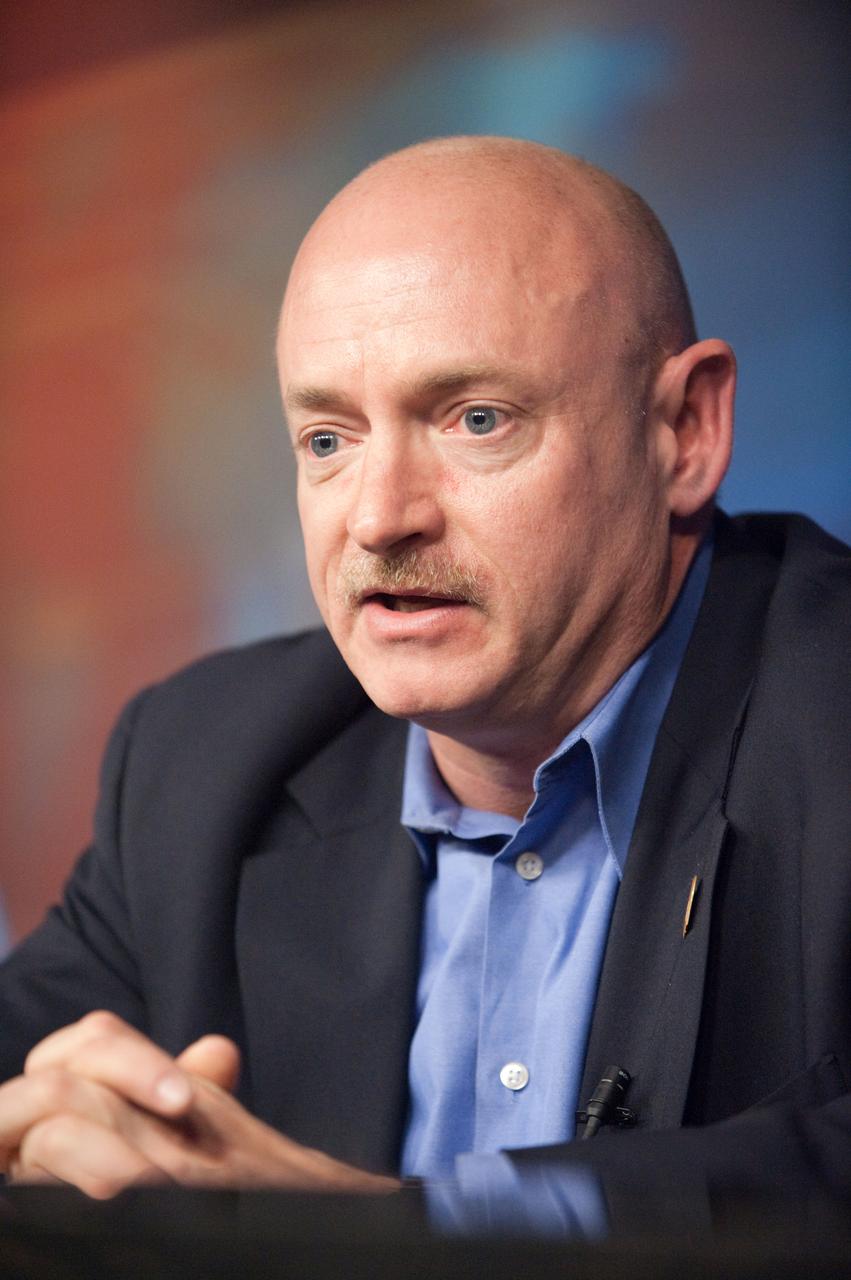 JSC2011-E-015242  (4 Feb. 2011) --- NASA astronaut Mark Kelly, STS-134 commander, listens  to a reporter?s question during a news conference at NASA's Johnson Space Center. The briefing was held to discuss Kelly resuming training as the STS-134 shuttle mission commander. With the exception of some proficiency training, Kelly has been on personal leave since Jan. 8 to care for his wife, congresswoman Gabrielle Giffords, who was critically wounded in a Tucson, Ariz. shooting. Photo credit: NASA or National Aeronautics and Space Administration