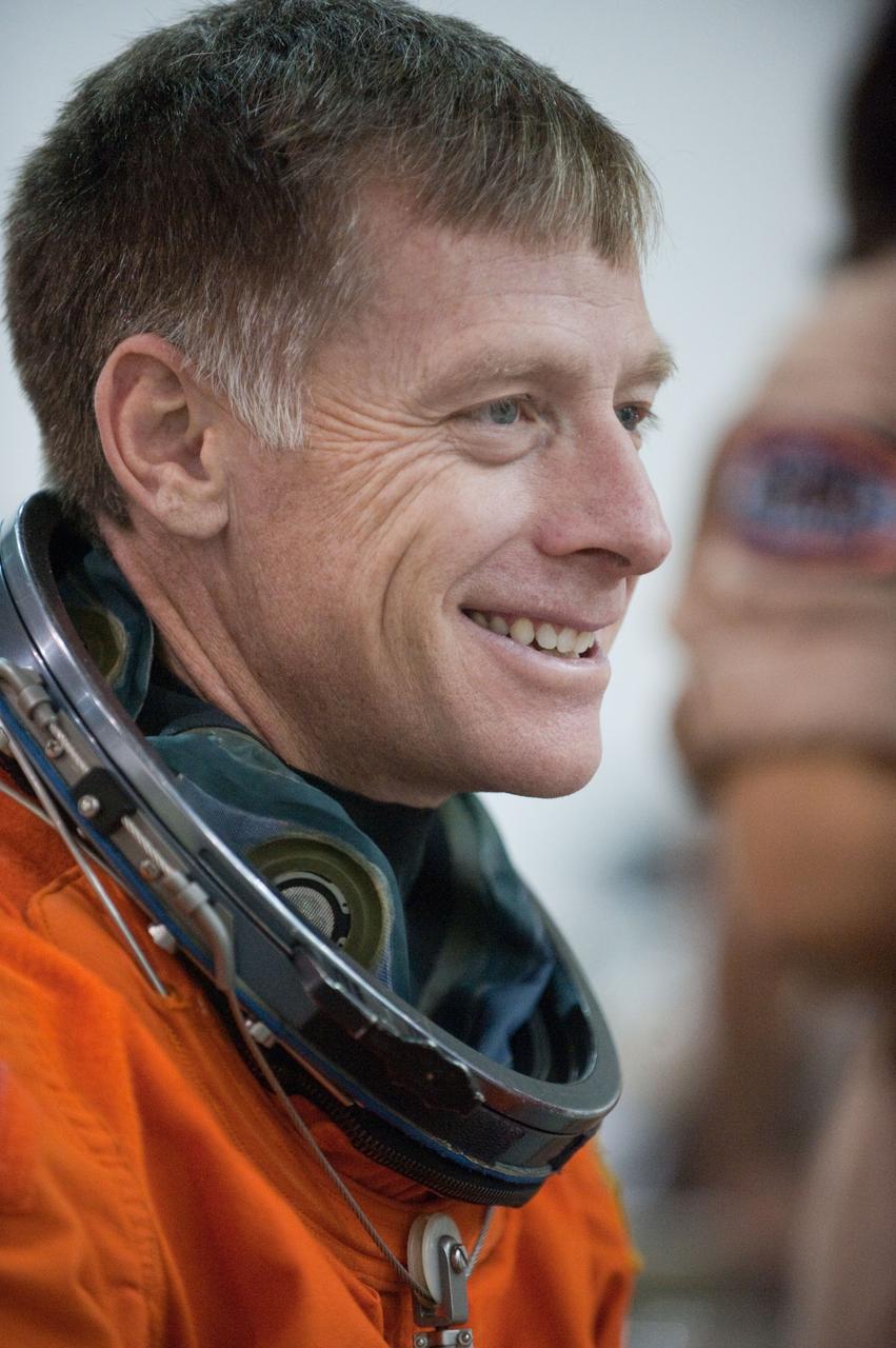 JSC2011-E-016237 (9 Feb. 2011) --- NASA astronaut Chris Ferguson, STS-135 commander, attired in a training version of his shuttle launch and entry suit, is pictured during a water survival training session in the Neutral Buoyancy Laboratory (NBL) near NASA's Johnson Space Center. STS-135 is planned to be the final mission of the space shuttle program. Photo credit: NASA or National Aeronautics and Space Administration