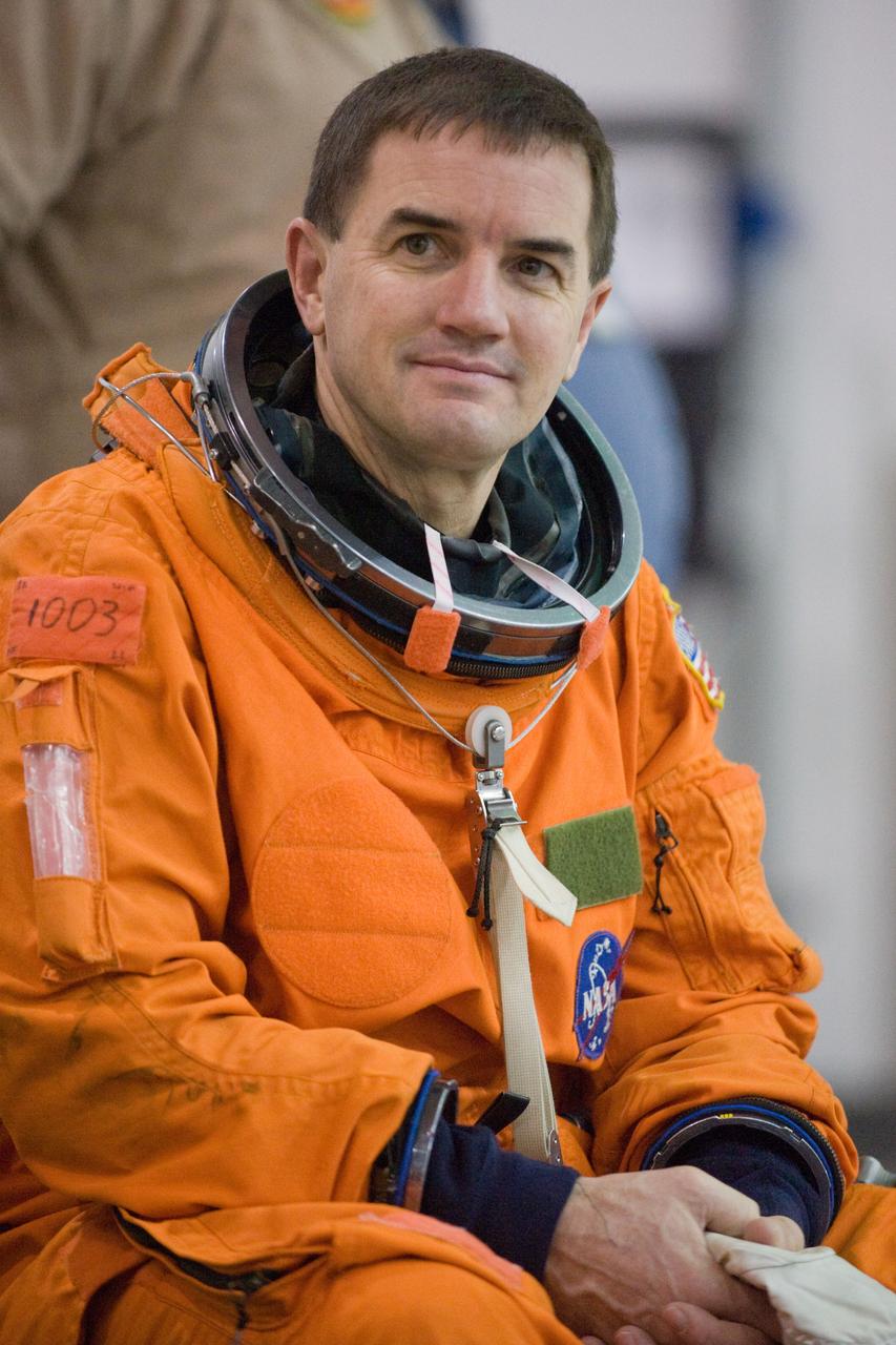 JSC2011-E-016239 (9 Feb. 2011) --- NASA astronaut Rex Walheim, STS-135 mission specialist, attired in a training version of his shuttle launch and entry suit, is pictured during a water survival training session in the Neutral Buoyancy Laboratory (NBL) near NASA's Johnson Space Center. STS-135 is planned to be the final mission of the space shuttle program. Photo credit: NASA or National Aeronautics and Space Administration