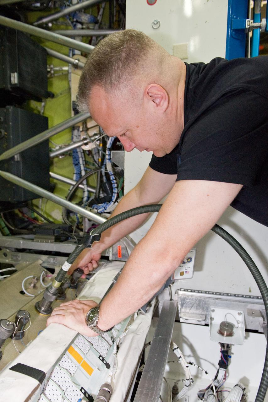 JSC2011-E-021722 (25 Feb. 2011) --- NASA astronaut Doug Hurley, STS-135 pilot, participates in a training session in a space station mock-up in the Space Vehicle Mock-up Facility at NASA's Johnson Space Center. Photo credit: NASA or National Aeronautics and Space Administration