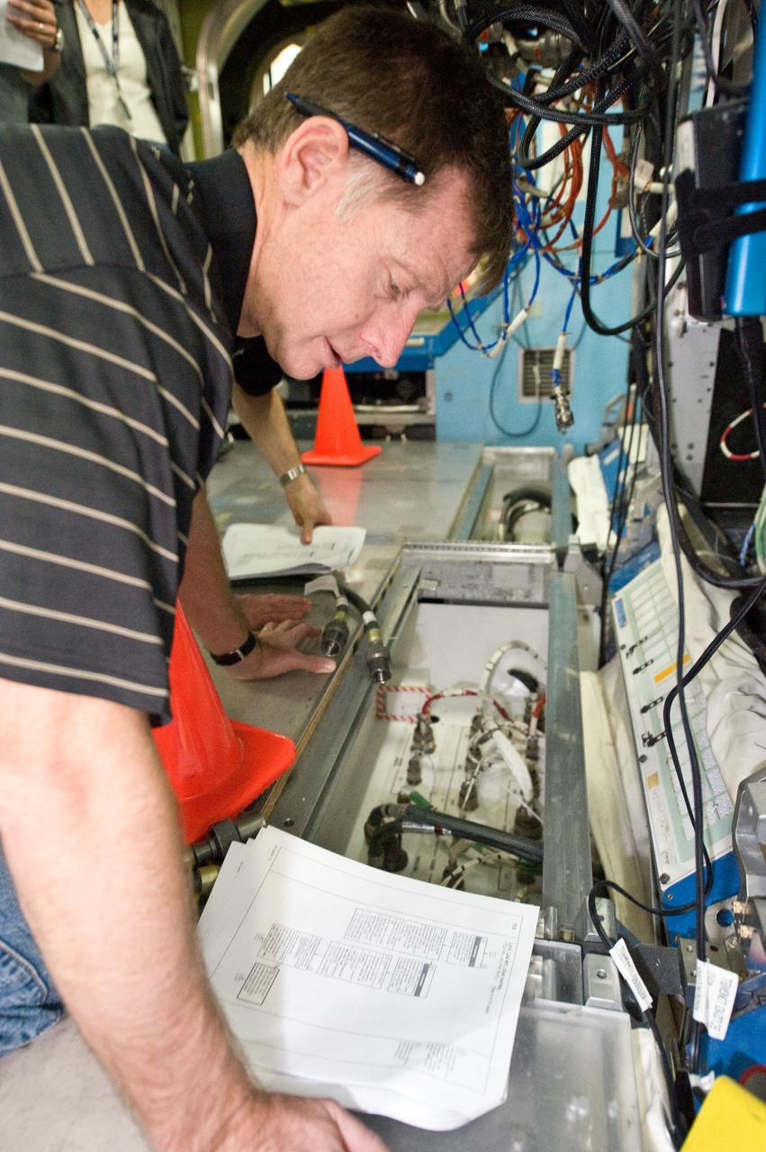 JSC2011-E-021726 (25 Feb. 2011) --- NASA astronaut Chris Ferguson, STS-135 commander, participates in a training session in a space station mock-up in the Space Vehicle Mock-up Facility at NASA's Johnson Space Center. Photo credit: NASA or National Aeronautics and Space Administration