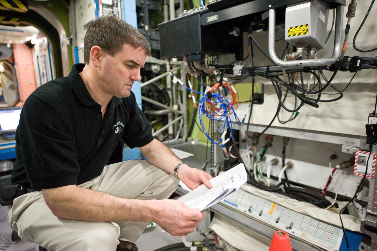 JSC2011-E-021727 (25 Feb. 2011) --- NASA astronaut Rex Walheim, STS-135 mission specialist, participates in a training session in a space station mock-up in the Space Vehicle Mock-up Facility at NASA's Johnson Space Center. Photo credit: NASA or National Aeronautics and Space Administration