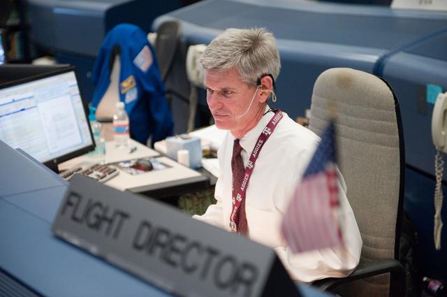 NASA image: STS133/ULF5 Flight Controllers on Console - Orbit 1