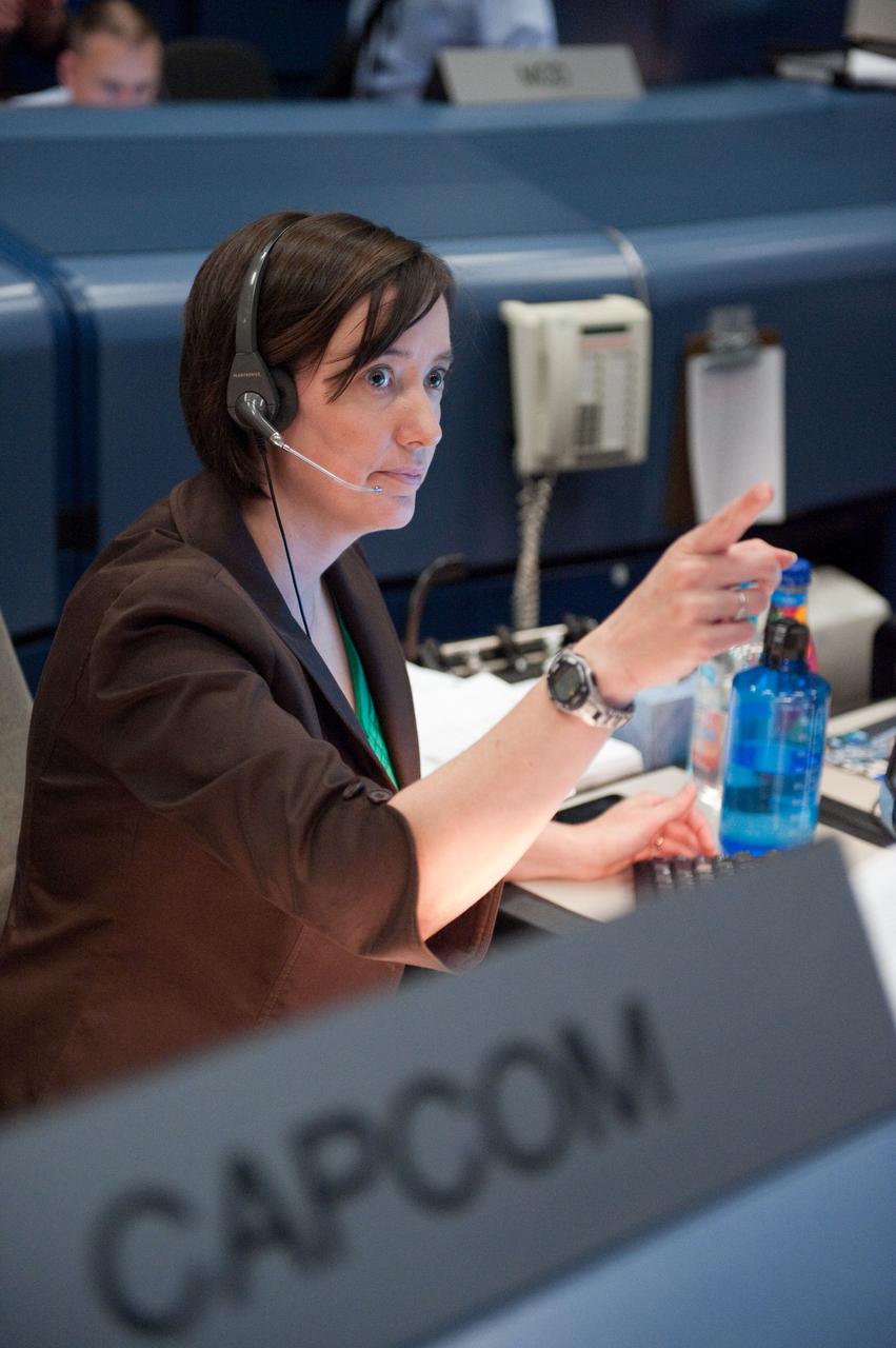 PHOTO DATE:  02-26-11 LOCATION: Bldg. 30 south  SUBJECT: STS-133/ULF5 Flight Controllers on Console - Shuttle Orbit 2.  Flight Director: Ginger Kerrick PHOTOGRAPHER: James Blair 