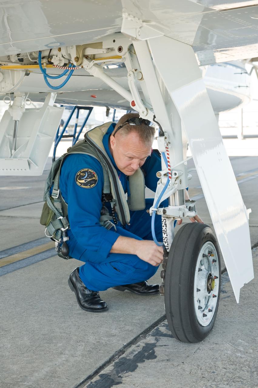JSC2011-E-024198 (1 March 2011) --- NASA astronaut Doug Hurley, STS-135 pilot, prepares for a flight in a NASA T-38 trainer jet at Ellington Field near NASA's Johnson Space Center. Photo credit: NASA or National Aeronautics and Space Administration