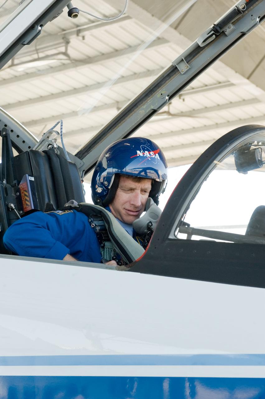 JSC2011-E-024203 (1 March 2011) --- NASA astronaut Chris Ferguson, STS-135 commander, prepares for a flight in a NASA T-38 trainer jet at Ellington Field near NASA's Johnson Space Center. Photo credit: NASA or National Aeronautics and Space Administration