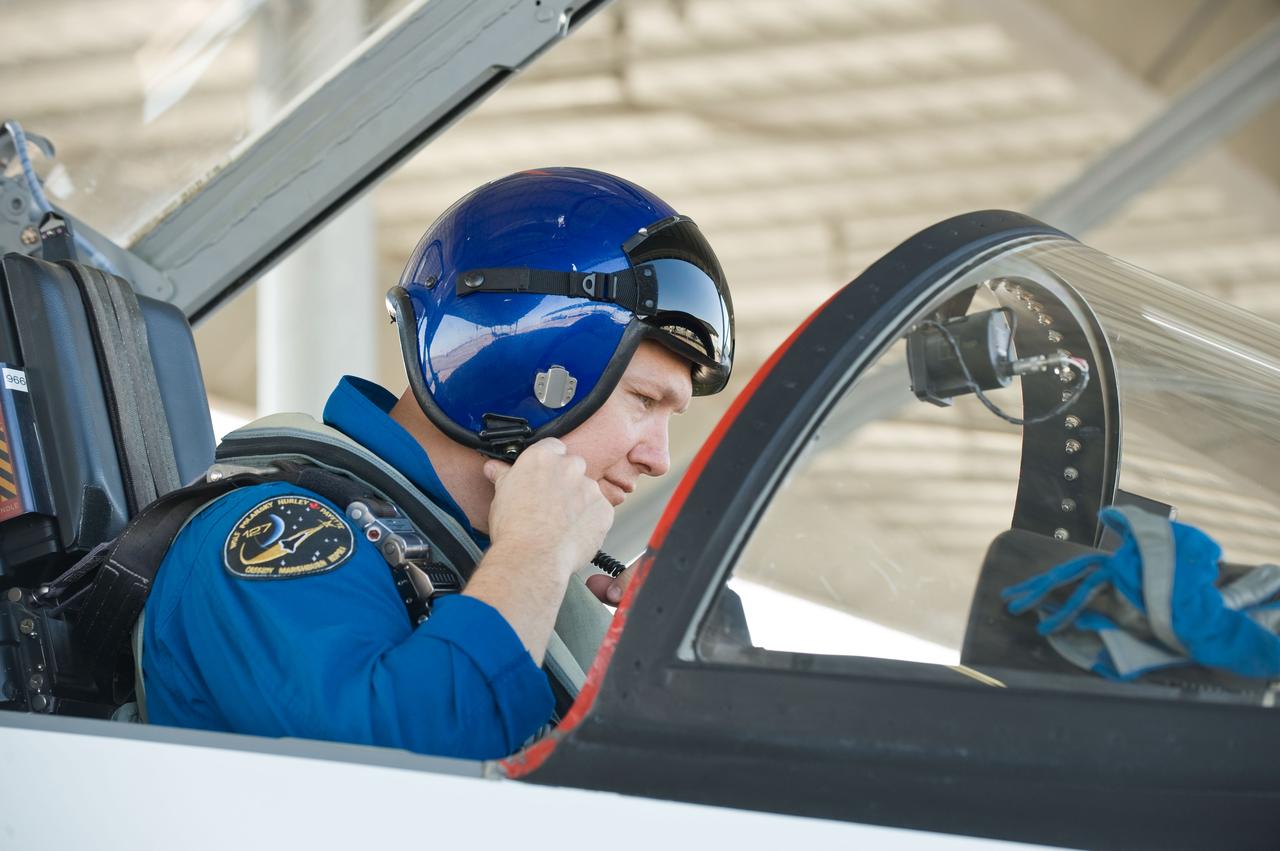 JSC2011-E-024206 (1 March 2011) --- NASA astronaut Doug Hurley, STS-135 pilot, prepares for a flight in a NASA T-38 trainer jet at Ellington Field near NASA's Johnson Space Center. Photo credit: NASA or National Aeronautics and Space Administration