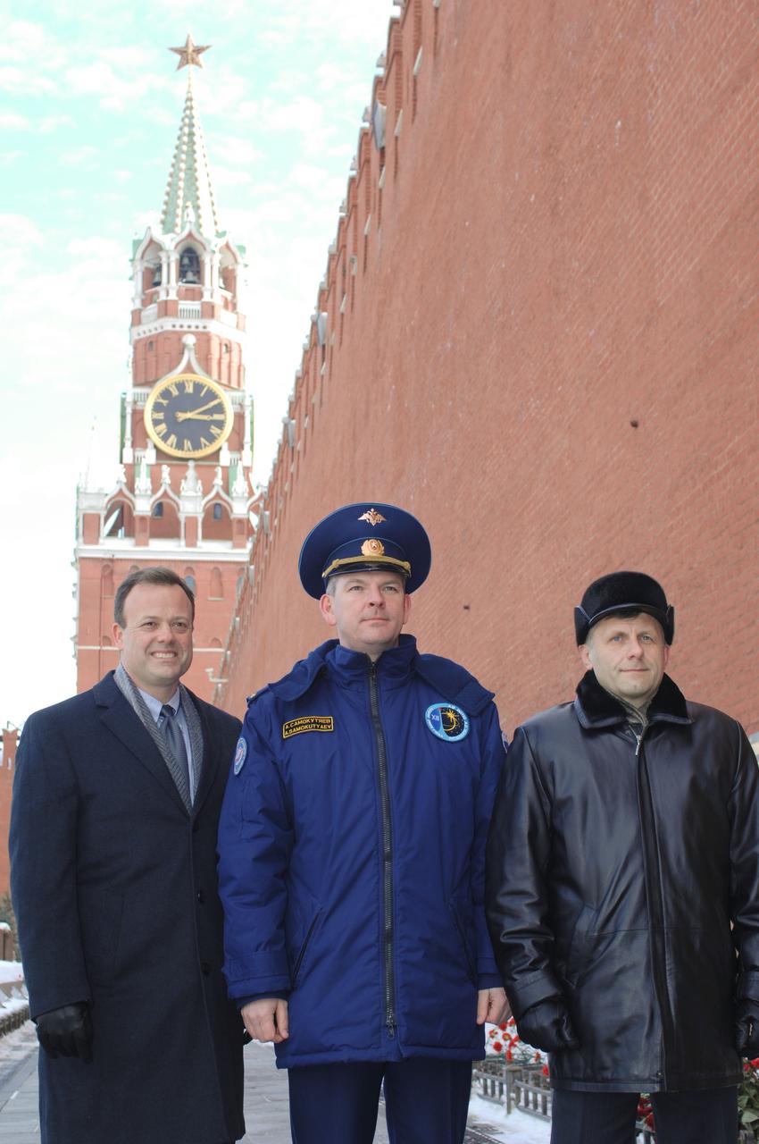 At the Kremlin Wall in Moscow March 11, 2011 (from the left to right) NASA astronaut Ron Garan, Expedition 27 flight engineer; Russian cosmonaut Alexander Samokutyaev, Soyuz commander; and Russian cosmonaut Andrey Borisenko, flight engineer, posed for photographers. The three had just lain flowers in honor of fallen Russian icons as part of the ceremonial activities leading to their launch March 30 (Kazakhstan time) in their Soyuz TMA-21 spacecraft to the International Space Station. Photo credit: NASA/Mark Polansky