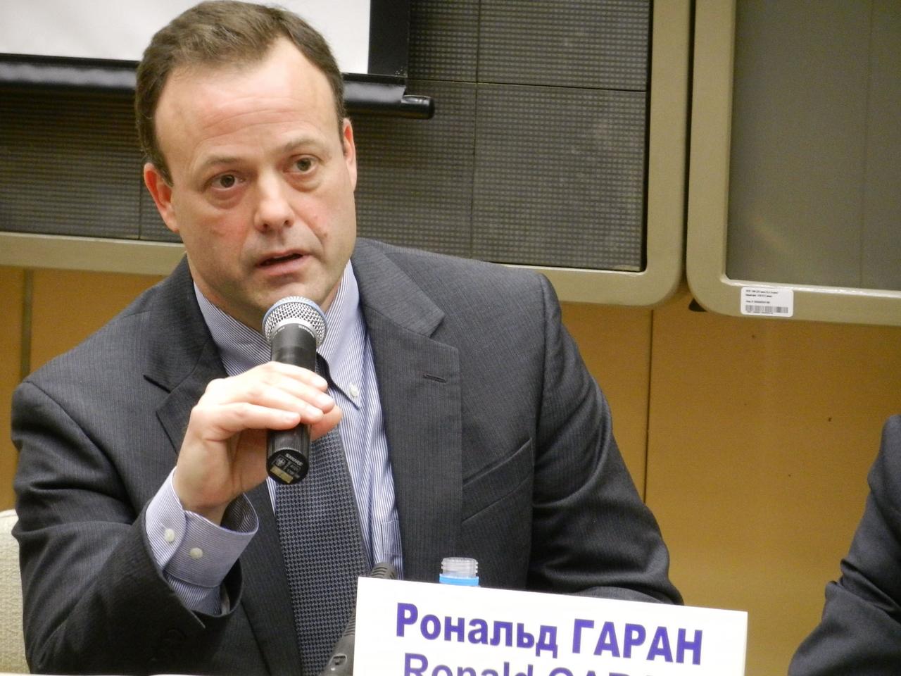 JSC2011-E-025836 (11 March 2011) --- NASA astronaut Ron Garan, Expedition 27 flight engineer, participates in a news conference held March 11, 2011 at the Gagarin Cosmonaut Training Center in Star City, Russia. Garan, Andrey Borisenko and Alexander Samokutyaev (out of frame) will launch in the Soyuz TMA-21 spacecraft from the Baikonur Cosmodrome in Kazakhstan March 30 (Kazakhstan time) for a 5 ? month stay on the International Space Station. Photo credit: NASA/Stephanie Stoll