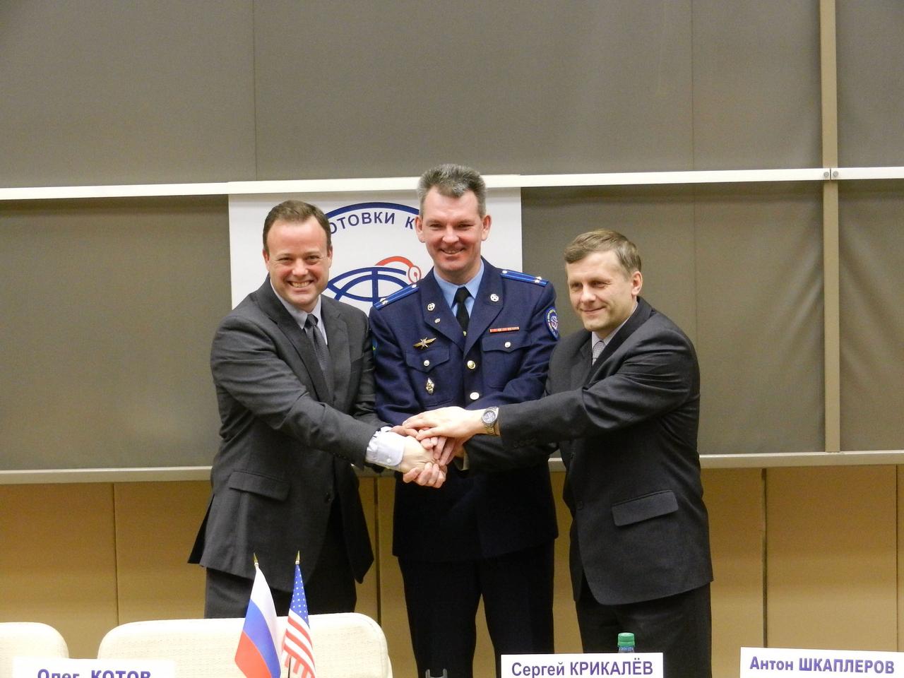 Expedition 27 prime crew members Ron Garan of NASA, and Russian cosmonauts Andrey Borisenko and Alexander Samokutyaev (far left), along with Expedition 27 backup crew members Anton Shklaperov, Anatoly Ivanishin and Daniel Burbank of NASA (far right), participate in a photo opportunity after a news conference held March 11, 2011 at the Gagarin Cosmonaut Training Center in Star City, Russia. Garan, Borisenko and Samokutyaev will launch in the Soyuz TMA-21 spacecraft from the Baikonur Cosmodrome in Kazakhstan March 30 (Kazakhstan time) for a 5 ½ month stay on the International Space Station. Photo credit: NASA/Stephanie Stoll