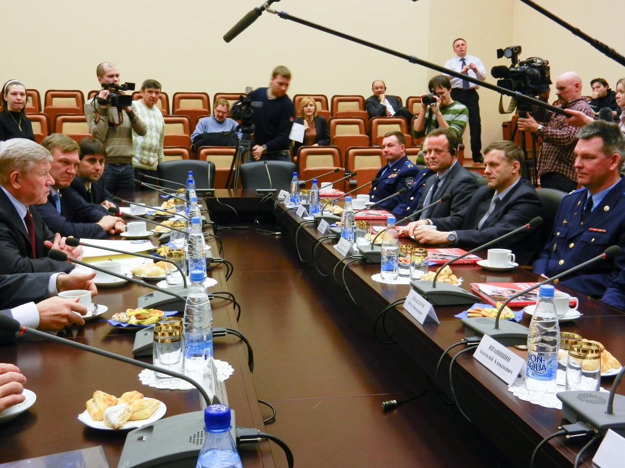 At the headquarters of the Russian Federal Space Agency (Roscosmos) in Moscow March 11, 2011, Roscosmos Head Anatoly Perminov (center left), Alexei Krasnov, Roscosmos’ Head of Piloted Space Programs, and Joel Montalbano, NASA Director of Human Spaceflight Programs, Russia, discuss the upcoming launch of the Soyuz TMA-21 spacecraft with Expedition 27 crew members, Russian cosmonaut Alexander Samokutyaev (far right), cosmonaut Andrey Borisenko, and NASA astronaut Ron Garan. Samokutyaev, Borisenko and Garan are scheduled to launch to the International Space Station on March 30 (Kazakhstan time). The occasion was a traditional “tea” with Perminov prior to the crew’s departure for the Baikonur Cosmodrome in Kazakhstan March 17. Photo credit: NASA/Stephanie Stoll  