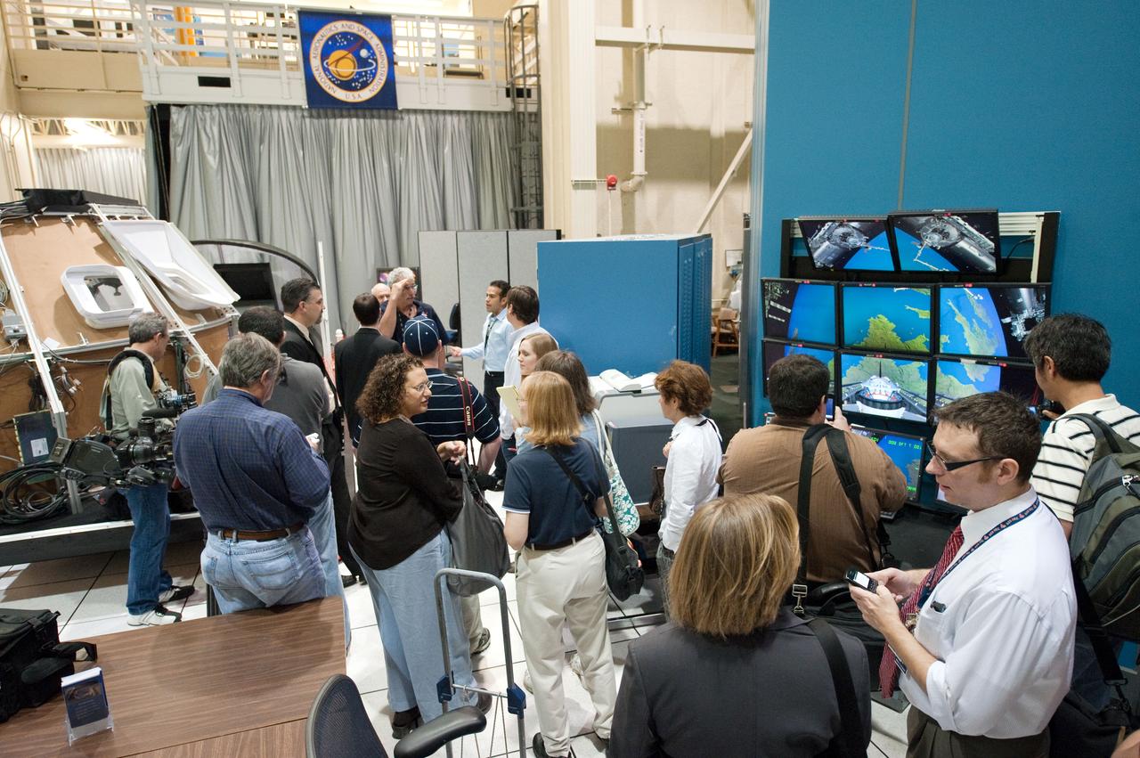 JSC2011-E-028125 (23 March 2011) --- News media representatives and NASA personnel are pictured during an STS-135 media day event in the Avionics Systems Laboratory at NASA's Johnson Space Center. Photo credit: NASA or National Aeronautics and Space Administration