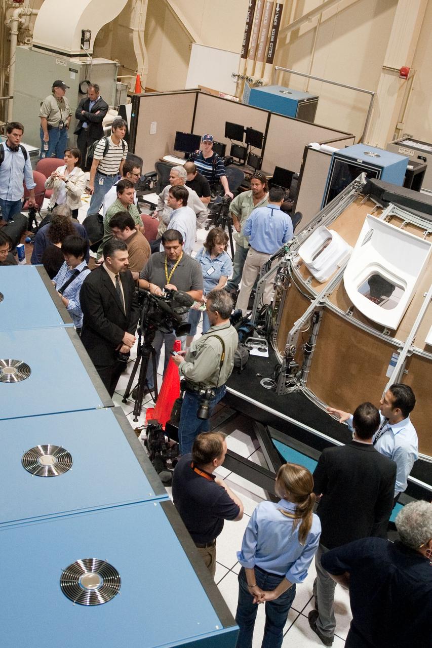 JSC2011-E-028128 (23 March 2011) --- News media representatives and NASA personnel are pictured during an STS-135 media day event in the Avionics Systems Laboratory at NASA's Johnson Space Center. Photo credit: NASA or National Aeronautics and Space Administration