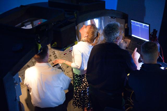 NASA image: STS-135 crew during Rendezvous Training session in Building 16 dome   