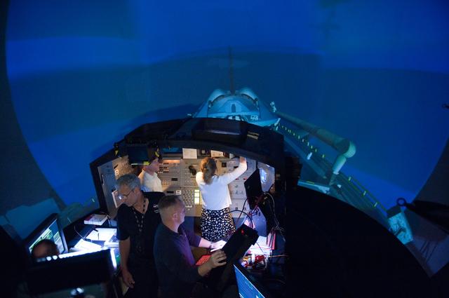 NASA image: STS-135 crew during Rendezvous Training session in Building 16 dome   