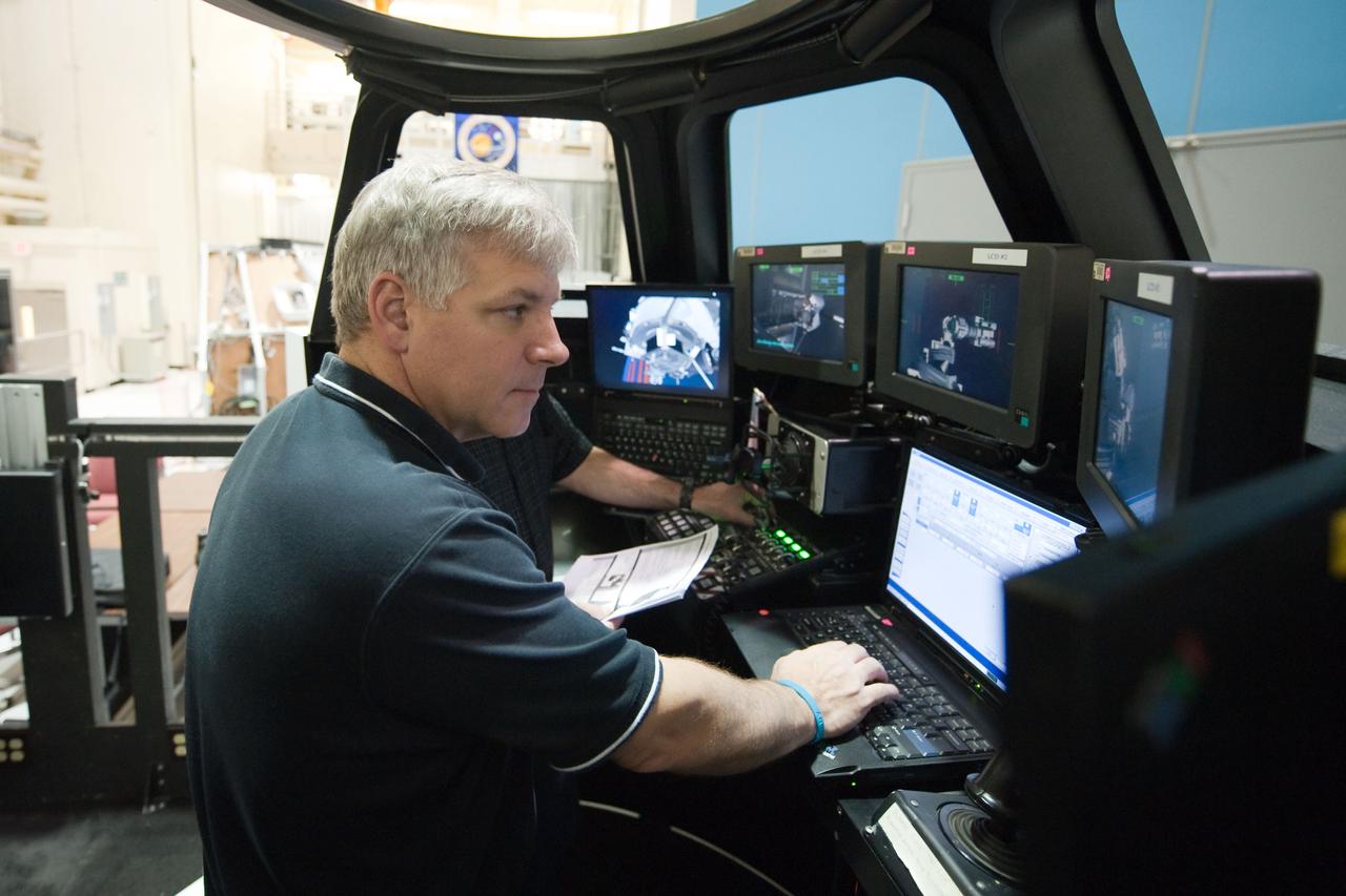 JSC2011-E-028158 (23 March 2011) --- NASA astronaut Greg H. Johnson, STS-134 pilot, participates in an exercise in the systems engineering simulator in the Avionics Systems Laboratory at NASA's Johnson Space Center. Photo credit: NASA or National Aeronautics and Space Administration