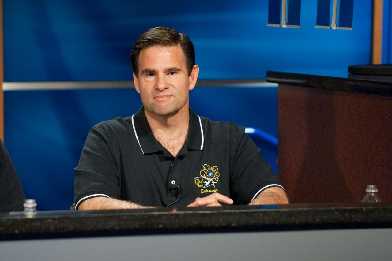 JSC2011-E-028492 (24 March 2011) --- NASA astronaut Greg Chamitoff, STS-134 mission specialist, fields a question from a reporter during a preflight press conference at NASA's Johnson Space Center. Photo credit: NASA or National Aeronautics and Space Administration