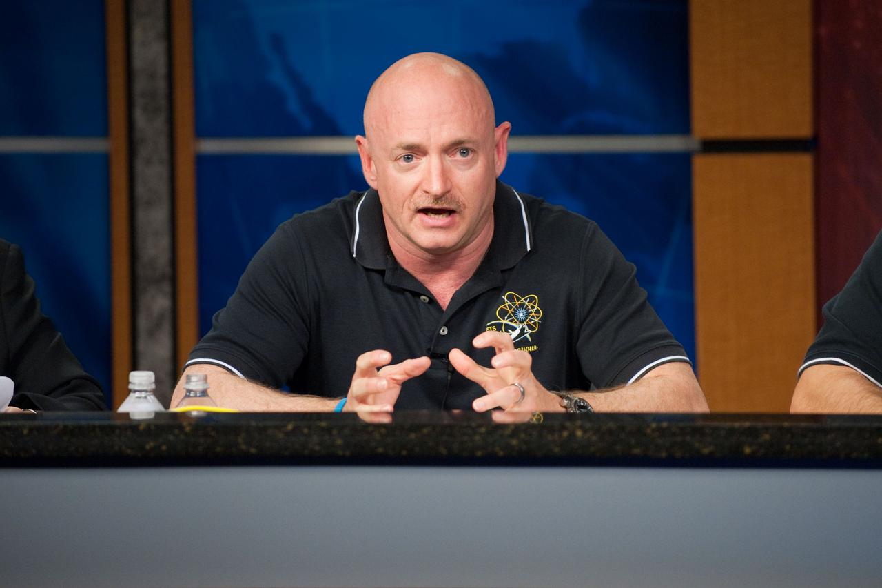 JSC2011-E-028493 (24 March 2011) --- NASA astronaut Mark Kelly, STS-134 commander, responds to a question from a reporter during a preflight press conference at NASA's Johnson Space Center. Photo credit: NASA or National Aeronautics and Space Administration