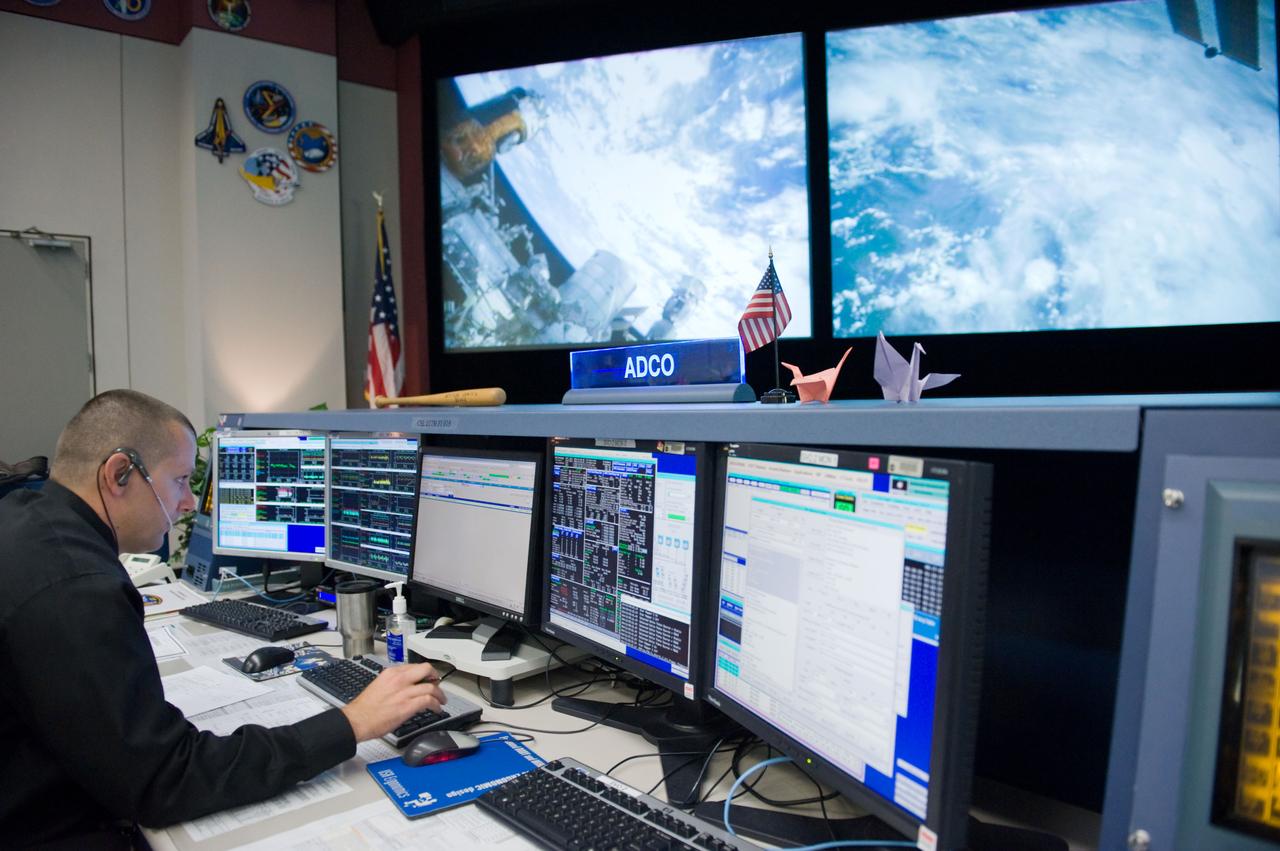 PHOTO DATE:  3-25-11 LOCATION:   Bldg. 30M, FCR-1 SUBJECT: JAXA flight control team gave the Folding Paper Cranes to NASA ISS mission control team and now they are decorated on their consoles.  The Folding Paper Cranes are for the people who suffer terrible pain from the earthquake in Japan. PHOTOGRAPHER:   Lauren Harnett