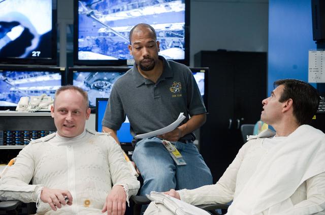NASA image: STS-134 crew members Michael Fincke and Greg Chamitoff during their final EVA4 training run at the NBL.