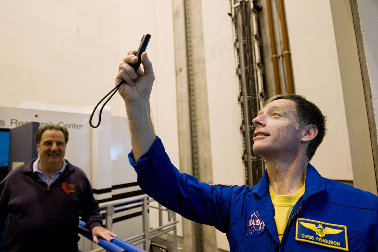 JSC2011-E-040195 (2 March 2011) --- NASA astronaut Chris Ferguson, STS-135 commander, takes photos of the massive Vertical Motion Simulator (VMS) at NASA's AMES Research Center before the crew trains in the simulator on Wednesday, March 2, 2011, in Mountain View, Calif. Photo credit: NASA Photo/Houston Chronicle, Smiley N. Pool