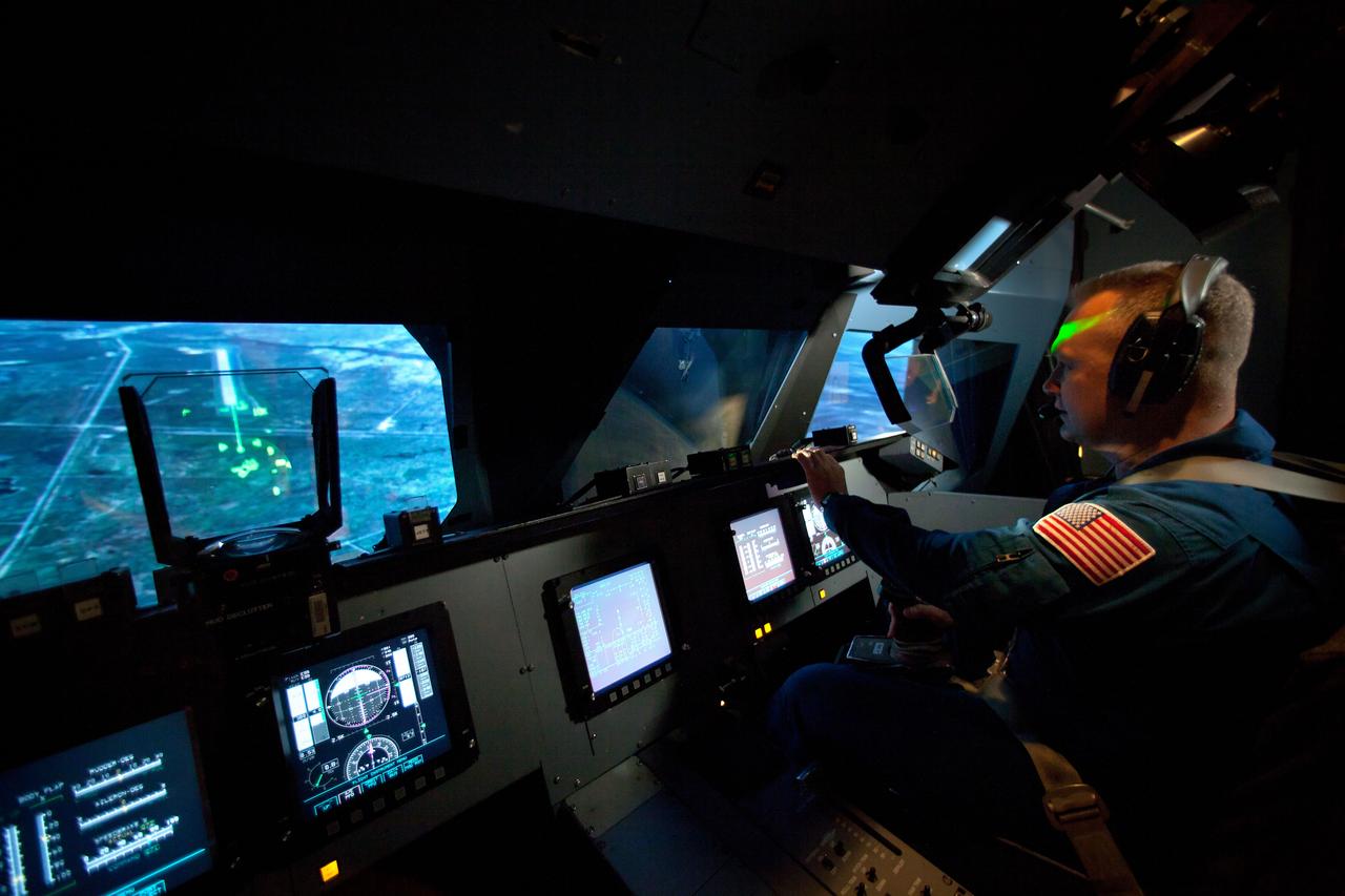 JSC2011-E-040201 (2 March 2011) --- NASA astronaut Doug Hurley pilots a simulated landing at the Kennedy Space Center as the STS-135 crew trains in the Vertical Motion Simulator (VMS) at NASA's Ames Research Center in Mountain View, Calif. on March 2, 2011. Photo credit: NASA Photo/Houston Chronicle, Smiley N. Pool