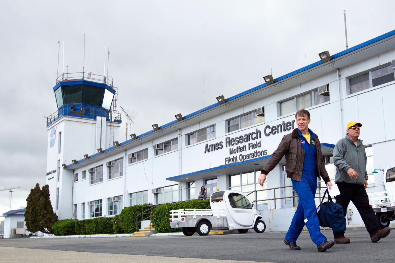 JSC2011-E-040202 (2 March 2011) --- NASA astronaut Chris Ferguson, STS-135 commander, departs from the Moffett Field (Calif.) flight operations center for his trip home to Houston after he and his crew trained in the Vertical Motion Simulator (VMS) at NASA's Ames Research Center in Mountain View, March 2, 2011. Photo credit: NASA Photo/Houston Chronicle, Smiley N. Pool