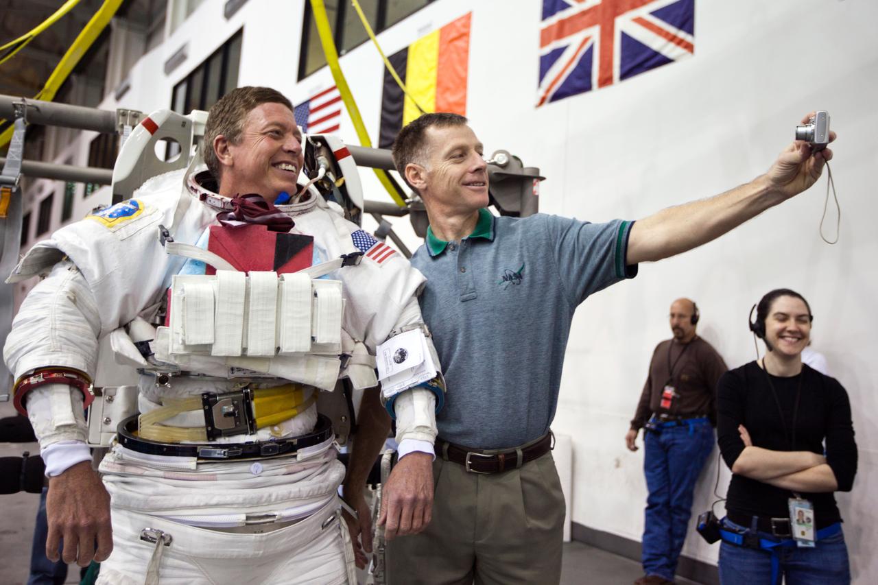 JSC2011-E-040209 (10 March 2011) --- NASA astronaut Chris Ferguson, STS-135 commander, takes a photo of himself with astronaut Mike Fossum before the crew of the final shuttle mission trains March 10, 2011 in the Neutral Buoyancy Laboratory near the Johnson Space Center in Houston. Fossum will fly to the International Space Station aboard a Russian Soyuz spacecraft scheduled for launch in May and will serve as flight engineer for Expedition 28 and as commander for Expedition 29. Since the crew of the final shuttle mission will consist of only four astronauts, the ISS crew will perform the mission's single scheduled spacewalk, and the crew of STS-135 will function in support of the EVA, with Rex Walheim serving as the internally-based 'quarterback' for the spacewalk. Photo credit: NASA Photo/Houston Chronicle, Smiley N. Pool
