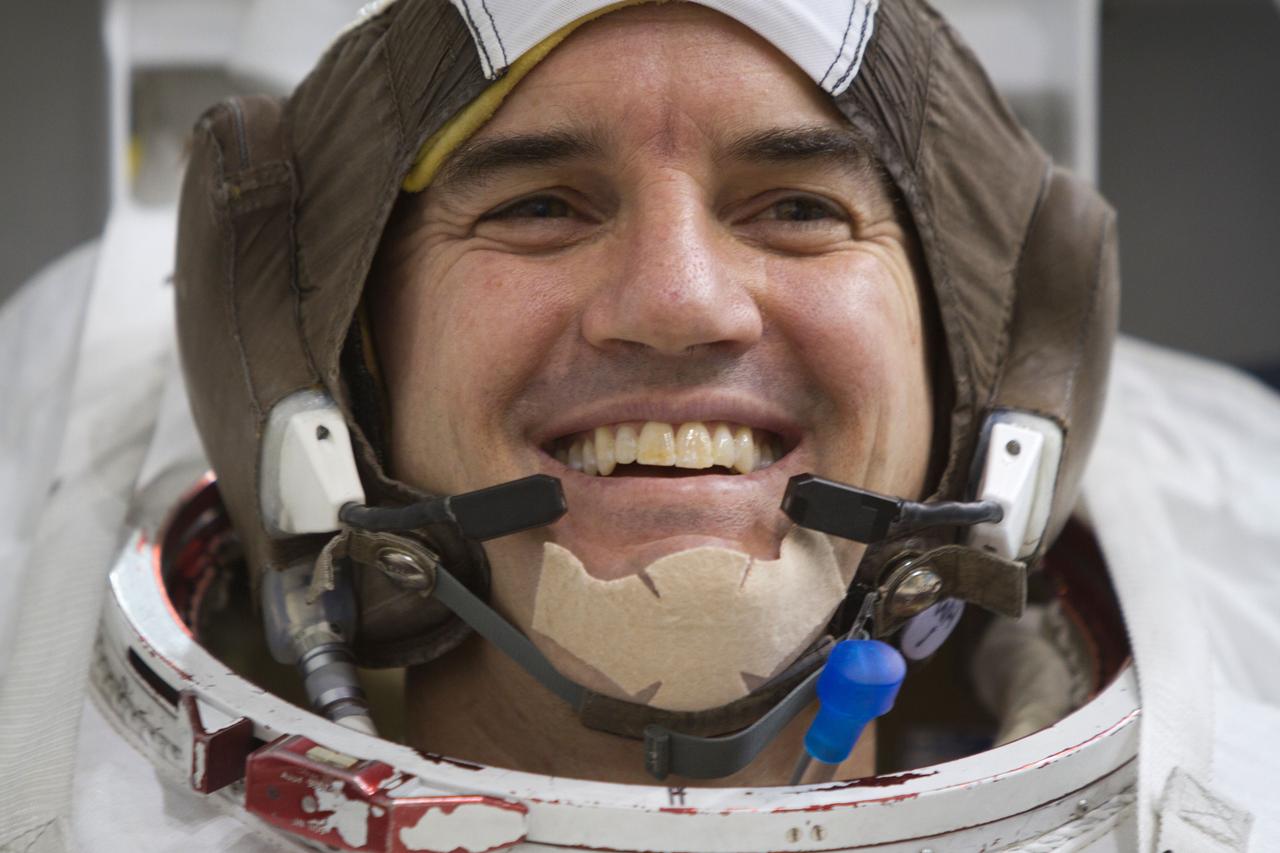 JSC2011-E-040211 (10 March 2011) --- NASA astronaut Rex Walheim, STS-135 mission specialist, prepares to train in the Neutral Buoyancy Laboratory (NBL) near NASA?s Johnson Space Center in Houston March 10, 2011. Photo credit: NASA Photo/Houston Chronicle, Smiley N. Pool