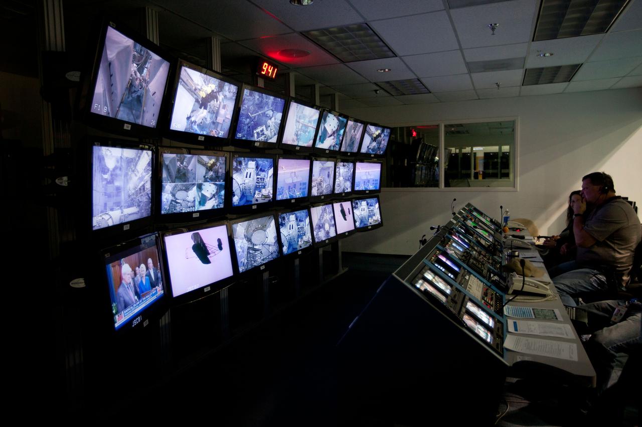 JSC2011-E-040215 (10 March 2011) --- A bank of video screens shows the progress of a simulated spacewalk as the crew of STS-135 trains in the Neutral Buoyancy Laboratory near NASA?s Johnson Space Center in Houston March 10, 2011. Photo credit: NASA Photo/Houston Chronicle, Smiley N. Pool