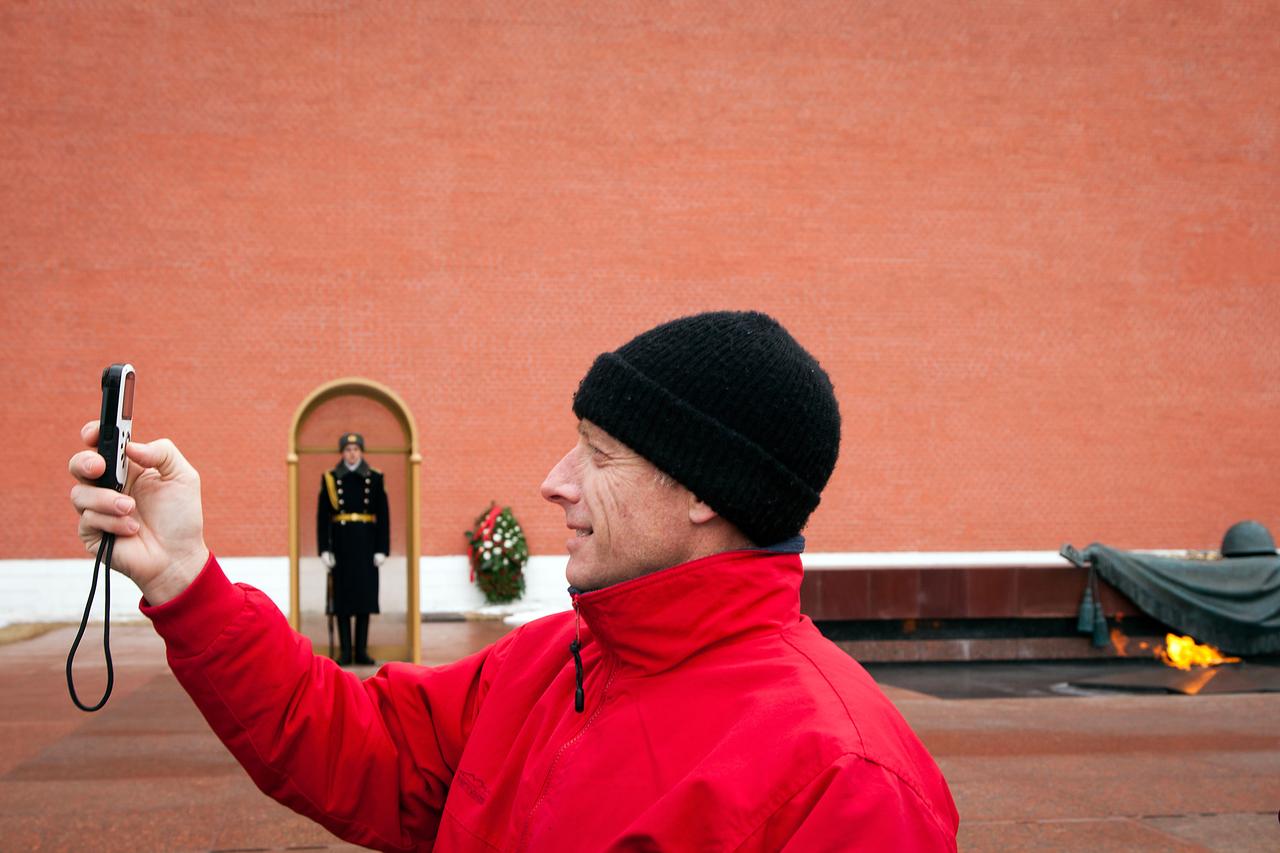 JSC2011-E-040330 (30 March 2011) --- NASA astronaut Chris Ferguson (foreground), STS-135 commander, visits Red Square in Moscow on March 30, 2011. The crew of the final shuttle mission traveled to Moscow for a suit fit check of their Russian Sokol suits which would be required in the event of an emergency. Photo credit:  NASA Photo/Houston Chronicle, Smiley N. Pool