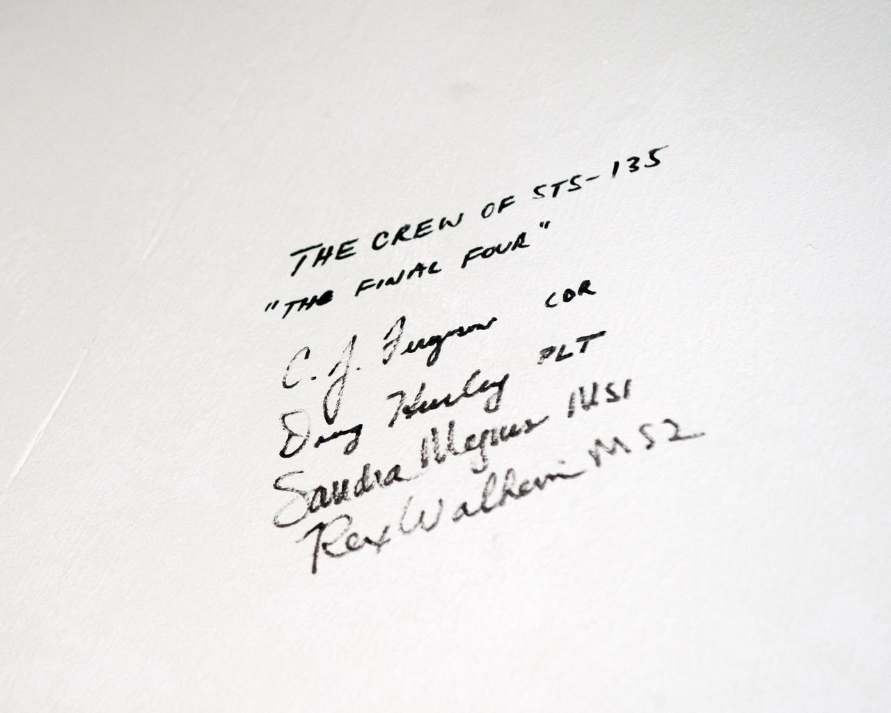 JSC2011-E-043693 (29 April 2011) --- A close-up view of the STS-135 crew members? signatures placed on hardware during an ingress/egress timeline training session in the Space Vehicle Mock-up Facility at NASA's Johnson Space Center. Photo credit: NASA