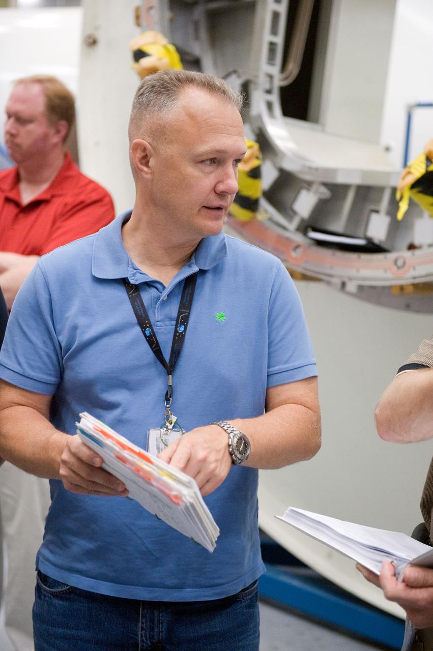 JSC2011-E-043701 (29 April 2011) --- NASA astronaut Doug Hurley, STS-135 pilot, participates in an ingress/egress timeline training session in the Space Vehicle Mock-up Facility at NASA's Johnson Space Center. Photo credit: NASA