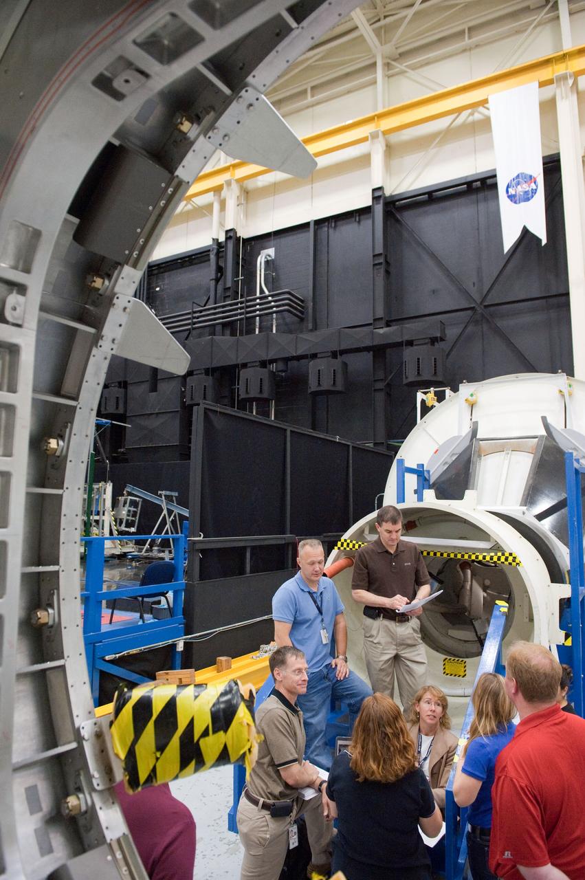 JSC2011-E-043705 (29 April 2011) --- NASA astronauts Chris Ferguson, STS-135 commander; Doug Hurley, pilot; Sandy Magnus and Rex Walheim, both mission specialists; along with crew instructors are pictured during an ingress/egress timeline training session in the Space Vehicle Mock-up Facility at NASA's Johnson Space Center. Photo credit: NASA