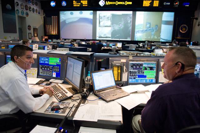 NASA image: STS-134 Flight Controllers on Console - Launch. Flight Director: Richard Jones    