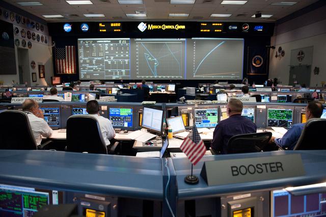 NASA image: STS-134 Flight Controllers on Console - Launch. Flight Director: Richard Jones    