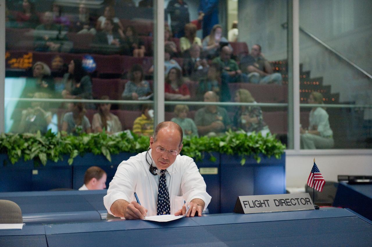JSC2011-E-044228 (16 May 2011) --- Flight director Tony Ceccacci is pictured at his console in the space shuttle flight control room in the Mission Control Center at NASA's Johnson Space Center during launch countdown activities a few hundred miles away in Florida, site of space shuttle Endeavour's STS-134 launch. Liftoff was at 8:56 a.m. (EDT) on May 16, 2011, from Launch Pad 39A at NASA's Kennedy Space Center. Photo credit: NASA