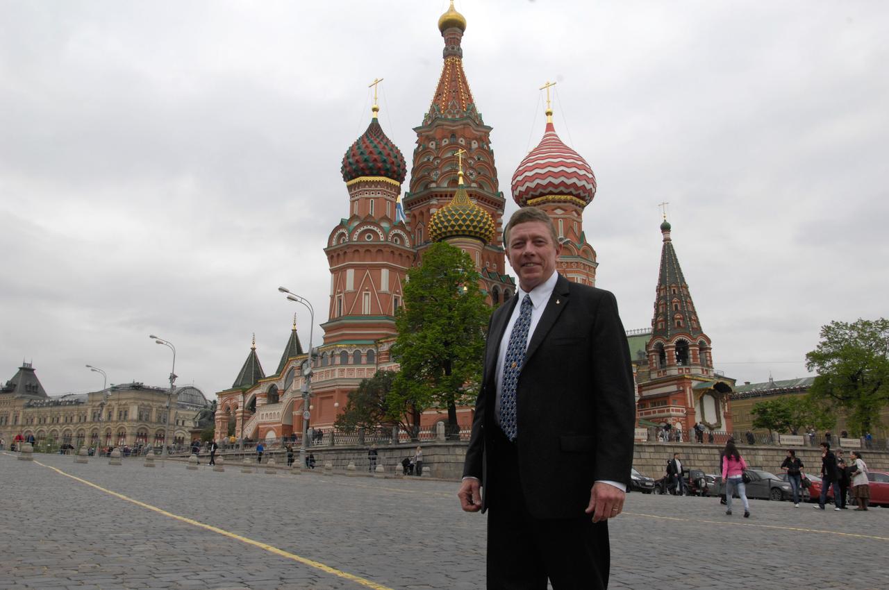 Expedition 28 Flight Engineer Mike Fossum of NASA poses for pictures in front of the famed St. Basil’s Cathedral in Red Square in Moscow May 16, 2011 as he and his crewmates conducted traditional activities in advance of their launch June 8 from the Baikonur Cosmodrome in Kazakhstan in the Soyuz TMA-02M spacecraft to the International Space Station. Fossum will launch with Soyuz Commander Sergei Volkov and Flight Engineer Satoshi Furukawa of the Japan Aerospace Exploration Agency to spend almost six months on the complex.