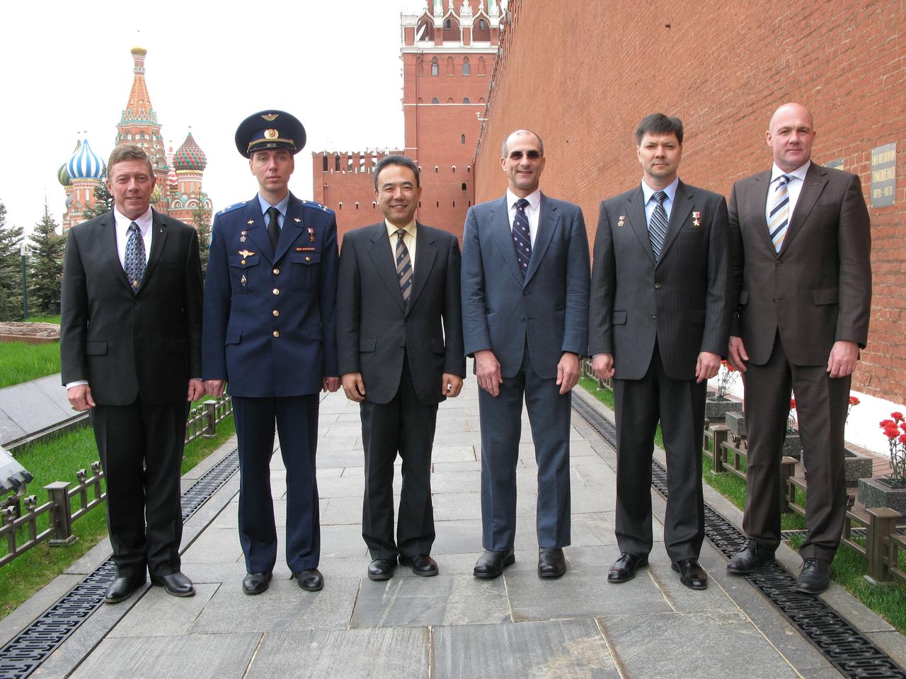 The prime and backup crewmembers for Expedition 28 to the International Space Station pose for pictures at the Kremlin Wall in Red Square May 16, 2011 after conducting traditional activities for the launch of the prime crew June 8 on the Soyuz TMA-02M spacecraft from the Baikonur Cosmodrome in Kazakhstan to the complex. From left to right are prime Flight Engineer Mike Fossum of NASA, prime Soyuz Commander Sergei Volkov, prime Flight Engineer Satoshi Furukawa of the Japan Aerospace Exploration Agency, NASA backup Flight Engineer Don Pettit, backup Soyuz Commander Oleg Kononenko and backup Flight Engineer Andre Kuipers of the European Space Agency.