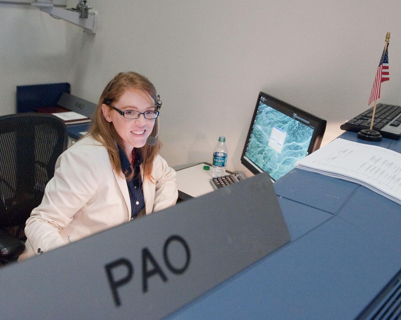 JSC2011-E-045467 (17 May 2011) --- Public Affairs Office (PAO) mission commentator Brandi Dean is pictured at her console in the space shuttle flight control room in the Mission Control Center at NASA's Johnson Space Center during STS-134 flight day two activities. Photo credit: NASA
