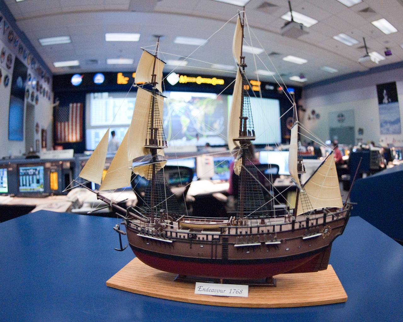 JSC2011-E-045472 (17 May 2011) --- A scale model of HM Bark Endeavour, namesake for the space shuttle currently making its final flight, adorns a console in the space shuttle flight control room in Mission Control in Houston. This model was first displayed in 1992 in the old shuttle control room during STS-49, the inaugural flight of the shuttle Endeavour.  It was built by Dan Willett of JSC's Information Resources Directorate.    The original sailing ship Endeavour was commanded by Lt. James Cook on a scientific voyage to the South Pacific, Australia and New Zealand from 1768 to 1771. Photo credit: NASA