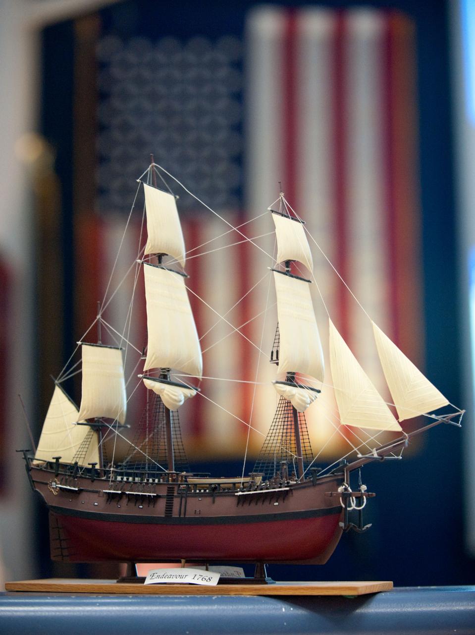JSC2011-E-046587 (20 May 2011) --- A scale model of HM Bark Endeavour, namesake for the space shuttle currently making its final flight, adorns a console in the space shuttle flight control room in Mission Control in Houston. This model was first displayed in 1992 in the old shuttle control room during STS-49, the inaugural flight of the shuttle Endeavour.  It was built by Dan Willett of JSC's Information Resources Directorate.    The original sailing ship Endeavour was commanded by Lt. James Cook on a scientific voyage to the South Pacific, Australia and New Zealand from 1768 to 1771.  Photo credit: NASA