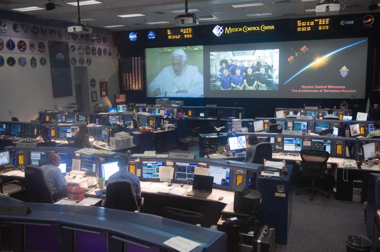 JSC2011-E-046603 (21 May 2011) --- This overall view of the space shuttle flight control room in the Mission Control Center at NASA's Johnson Space Center was taken during a special call from Pope Benedict XVI to the STS-134 and Expedition 27 crews on the International Space Station. The event was conducted from The Vatican at 6:11 a.m. (CDT) on May 21, 2011, and aired live on NASA television. Photo credit: NASA